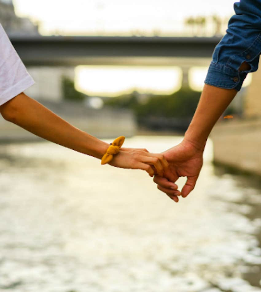 couple holding hands