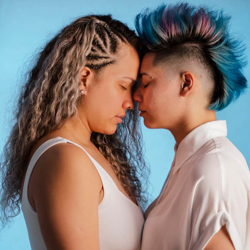 couple hugging forehead to forehead